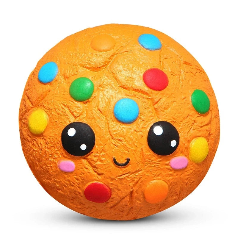 Squishy slatkiš – okrugli keks s šarenim kuglicama