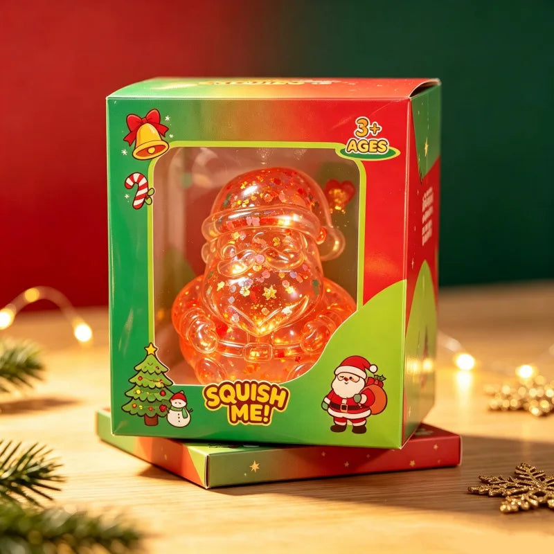 Squishy Božićni Glitter Figurice – Djed Mraz narančasti u kutiji